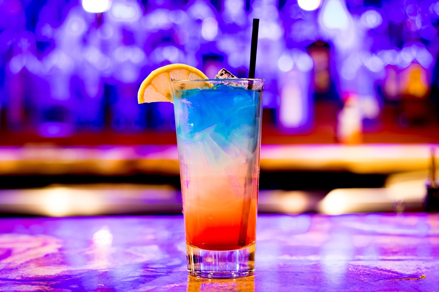 Multicolored Cocktail on a Bar Counter